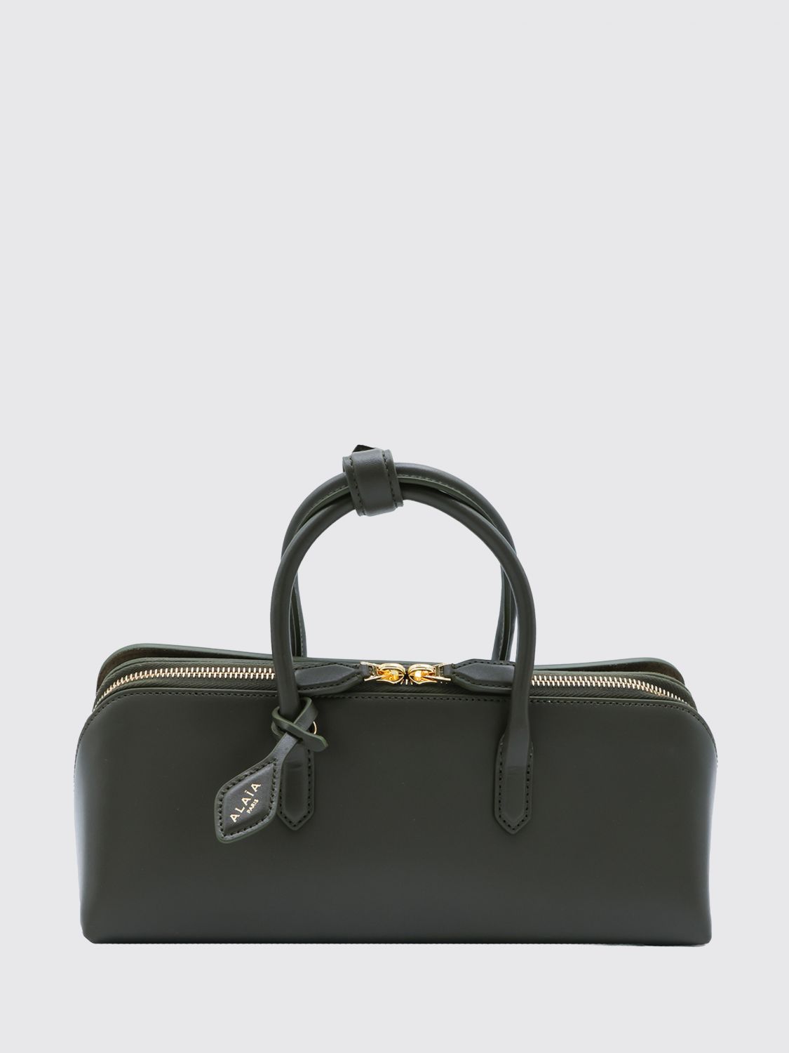 small leather handbag with double tubular handle and logo charm