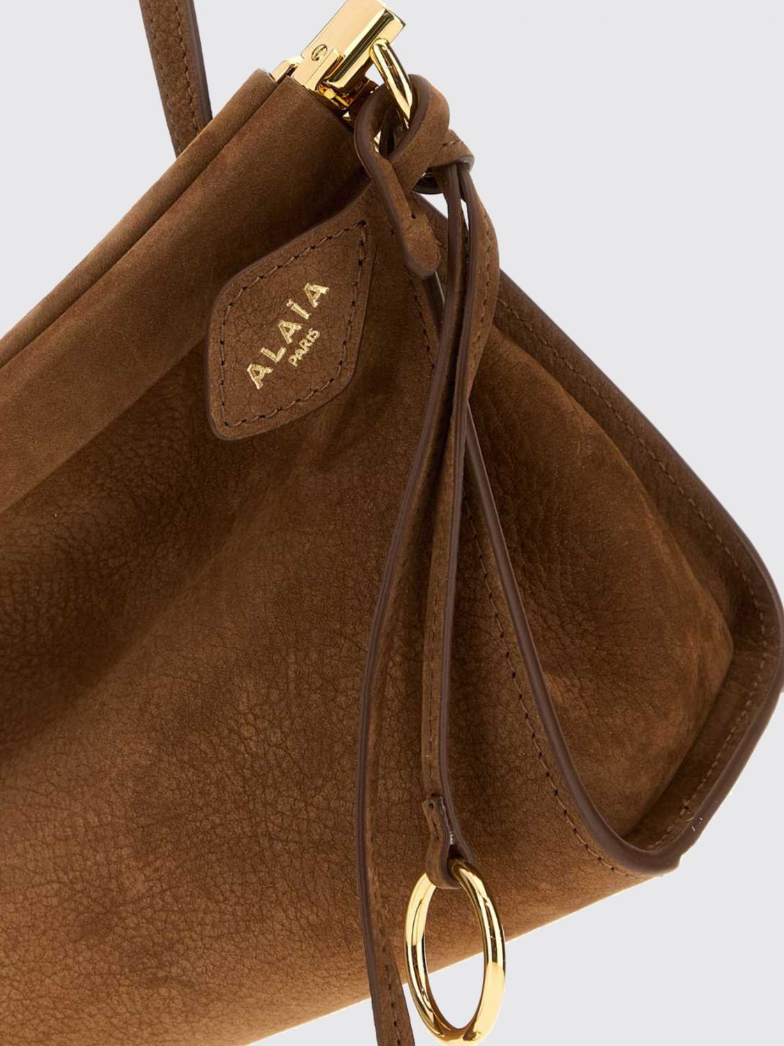 le click east west suede calfskin shoulder bag