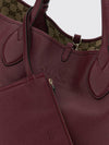 reversible shoulder bag in grained leather and logo fabric