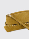 rockstud suede clutch with studs and wrist strap
