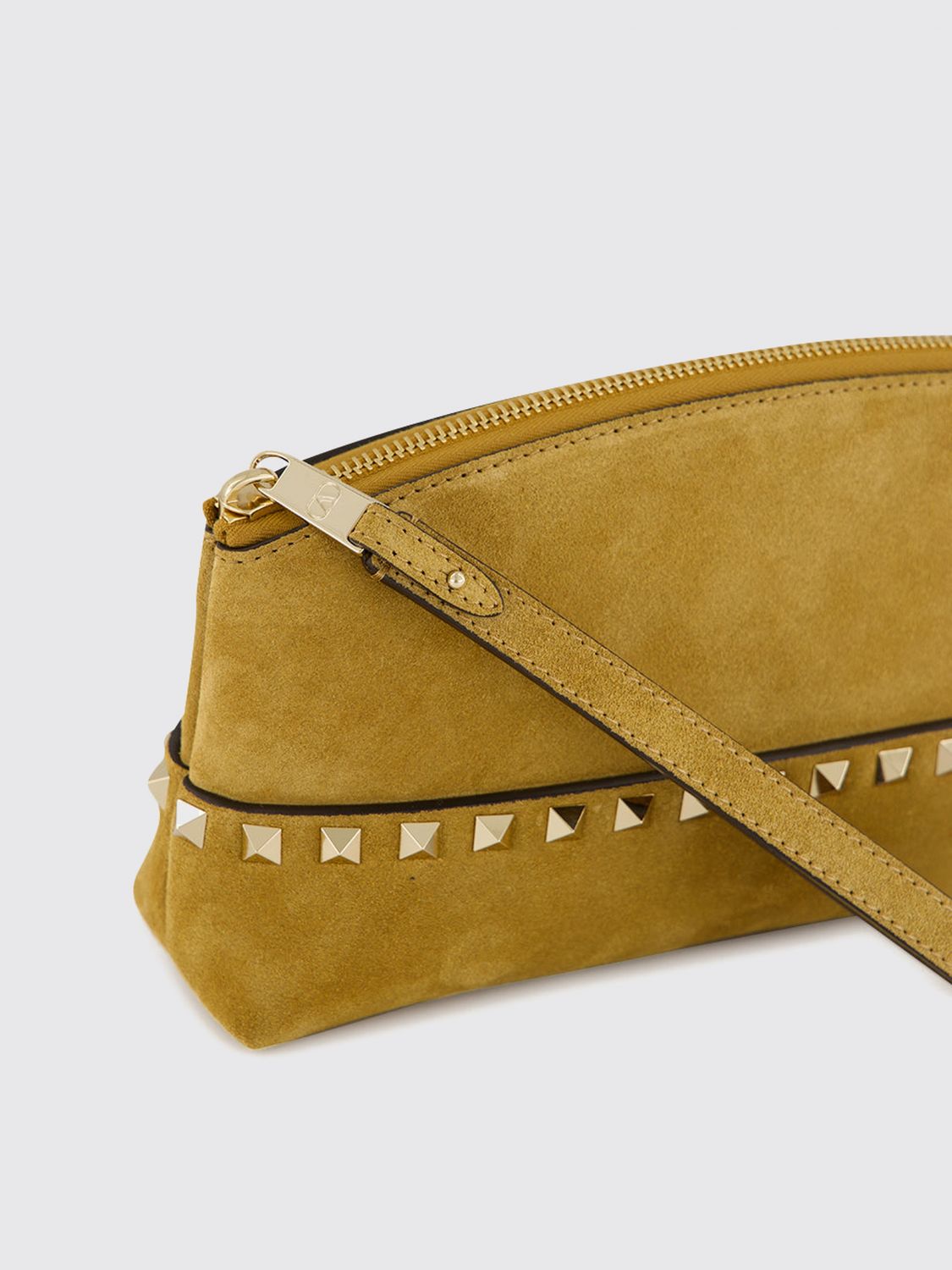 rockstud suede clutch with studs and wrist strap