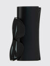 black acetate cat-eye sunglasses with flared shape and nylon lenses