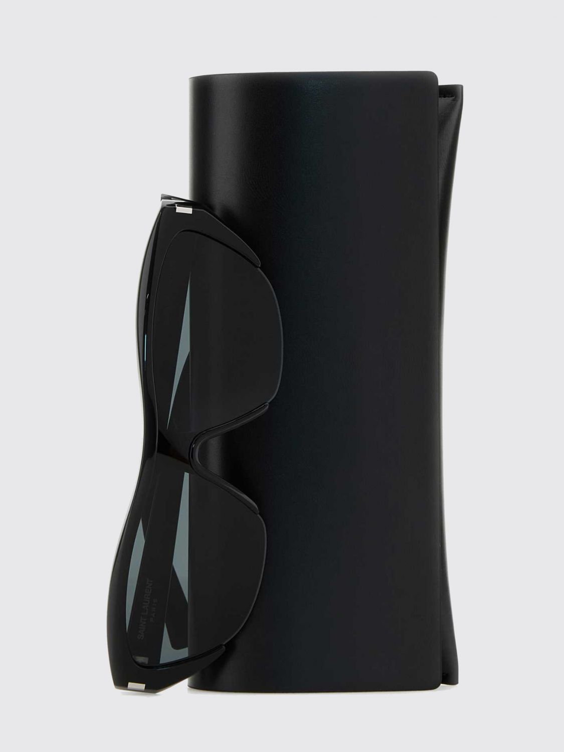 black acetate cat-eye sunglasses with flared shape and nylon lenses