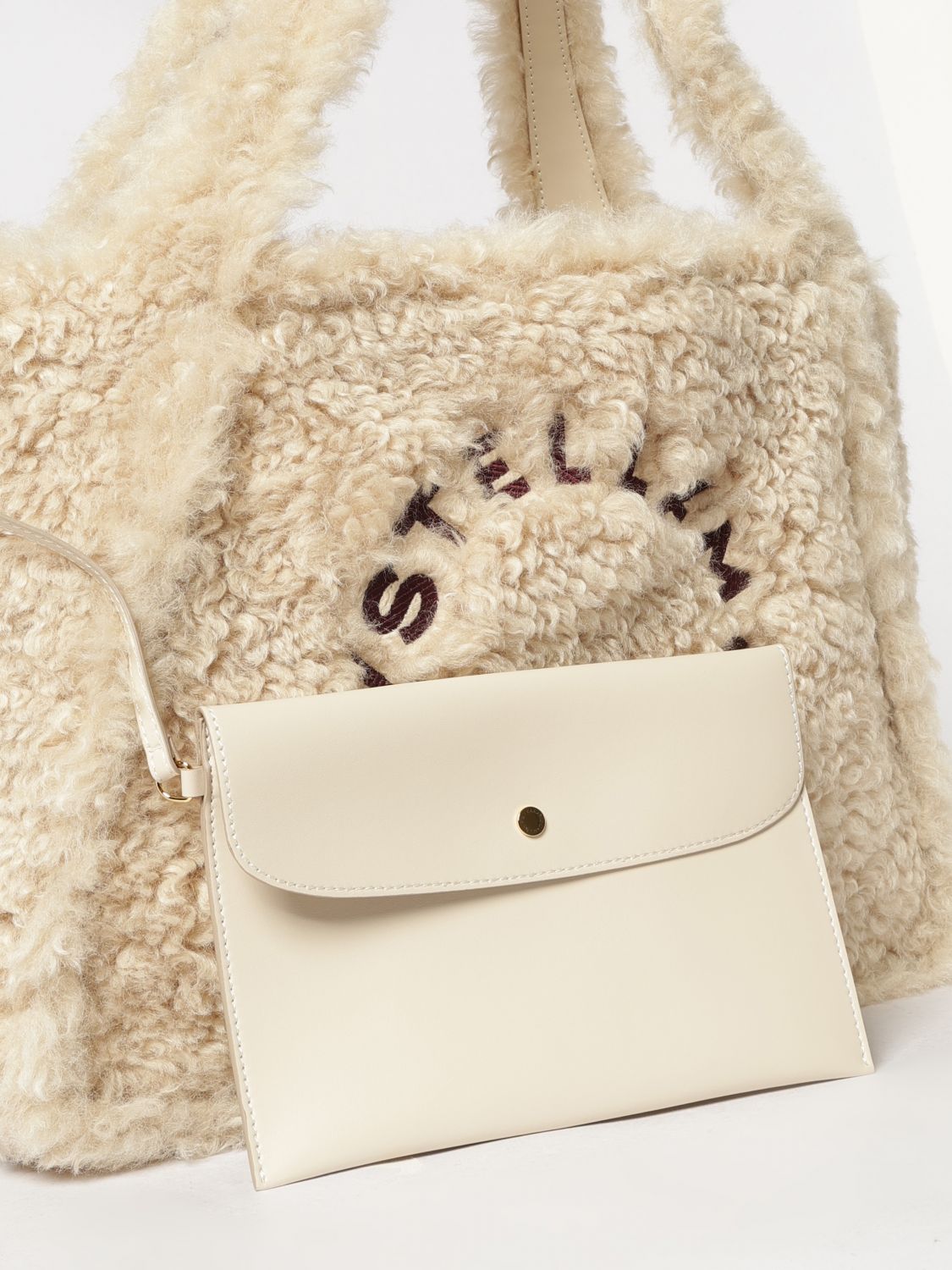 shearling shoulder bag with removable pouch