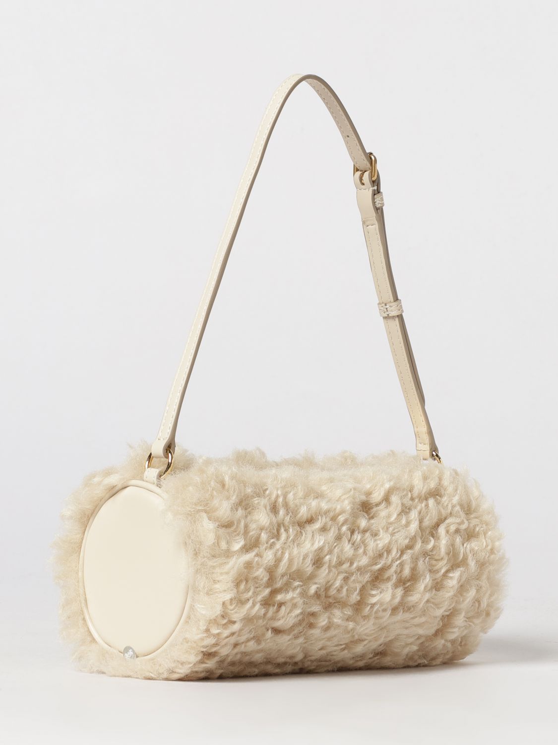 cylindrical shearling shoulder bag with adjustable handle