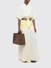 1969 raffia and leather tote bag with metallic rings