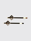 ff monogram hair clip in gold-tone brass with rhinestones