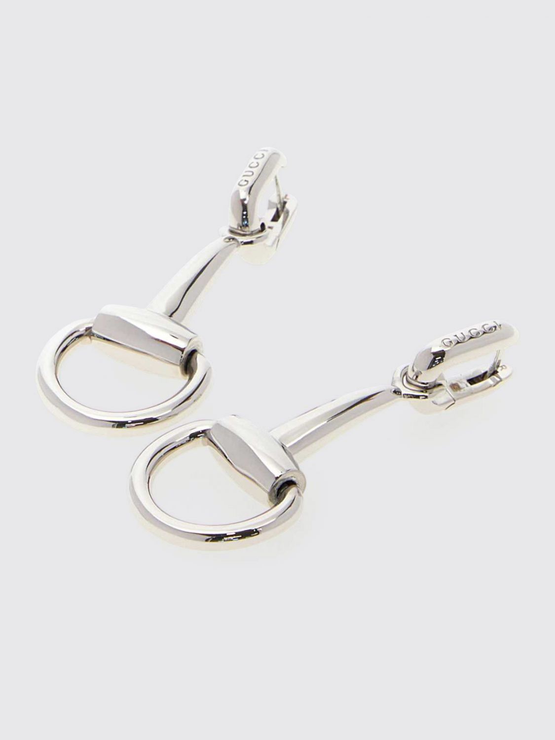 horsebit silver-finish metal dangle earrings