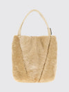 chloé spin shearling shoulder bag with double handle and decorative charm