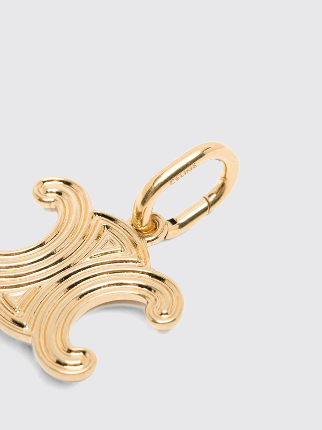 CELINE OS triomphe monogram pendant in two-tone gold and silver finish brass
