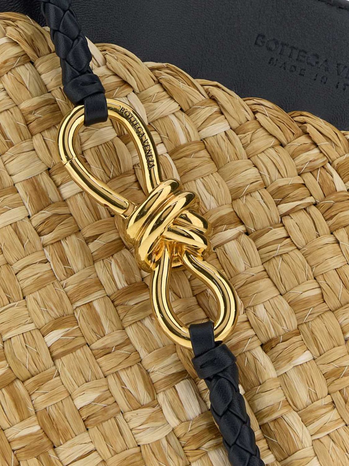 andiamo small woven raffia handbag with knot charm