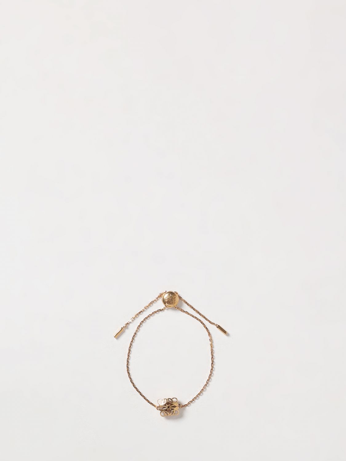 anagram brass bracelet with drawstring closure