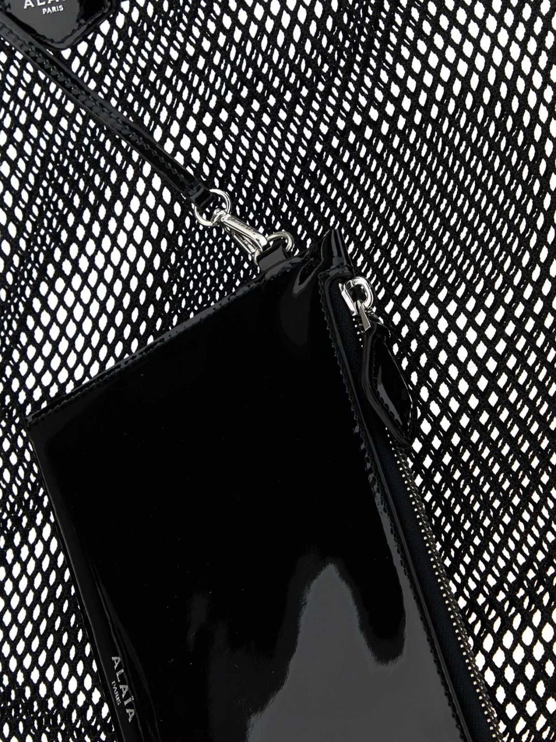 one piece perforated polyester tote bag with leather trim