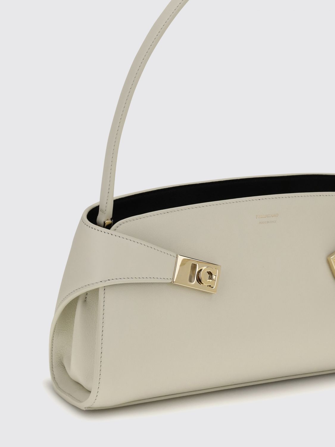 hug east-west leather shoulder bag with gancini buckle
