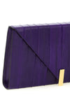 the giuseppe zanotti tuxedo clutch defines a rigorous aesthetic through clear