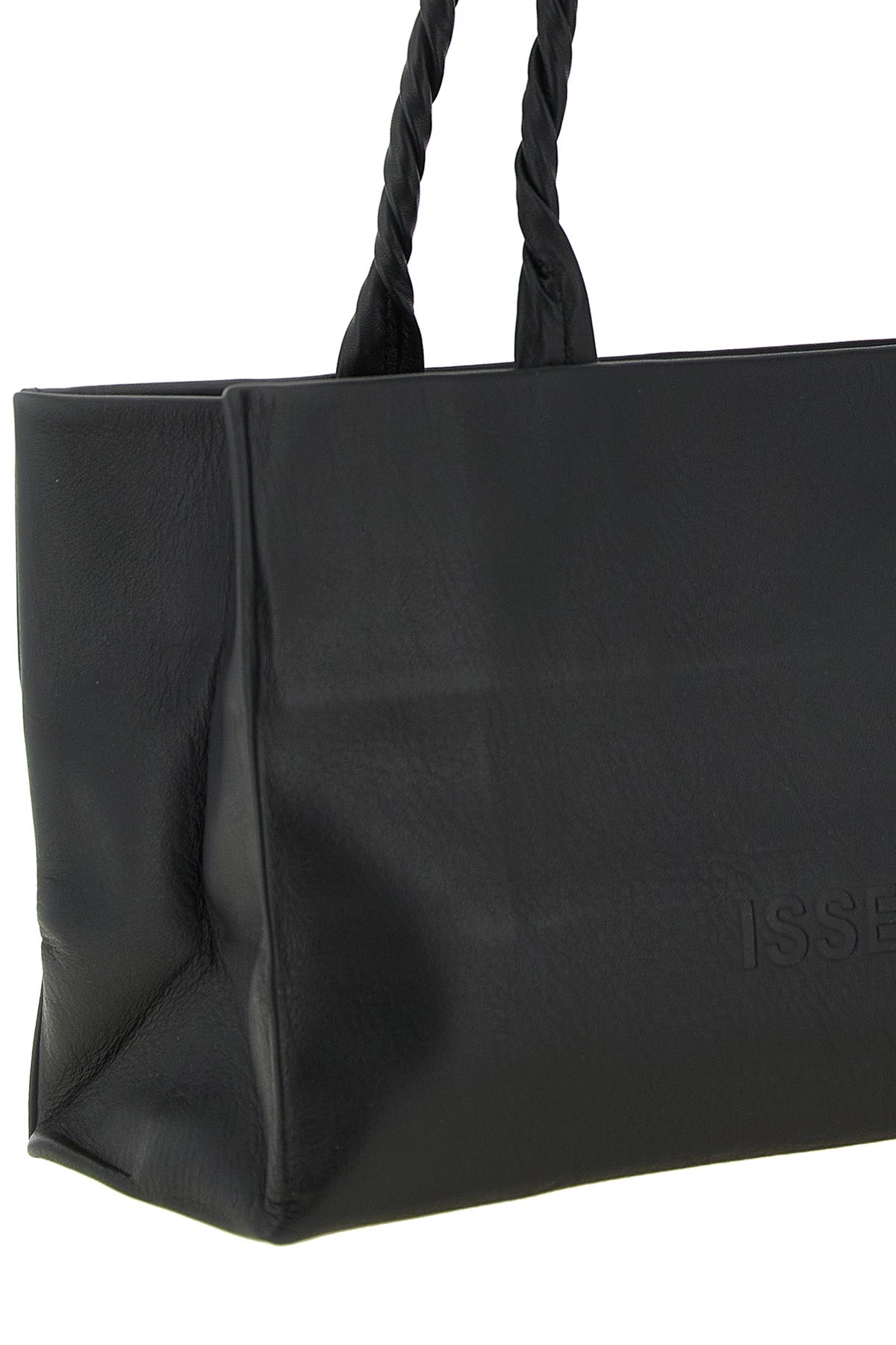 the issey miyake paper bag shoulder bag redefines everyday volumes through a m