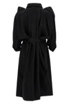 the calligraph issey miyake trench coat redefines classic volumes through a sc