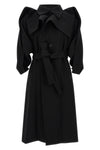 the calligraph issey miyake trench coat redefines classic volumes through a sc
