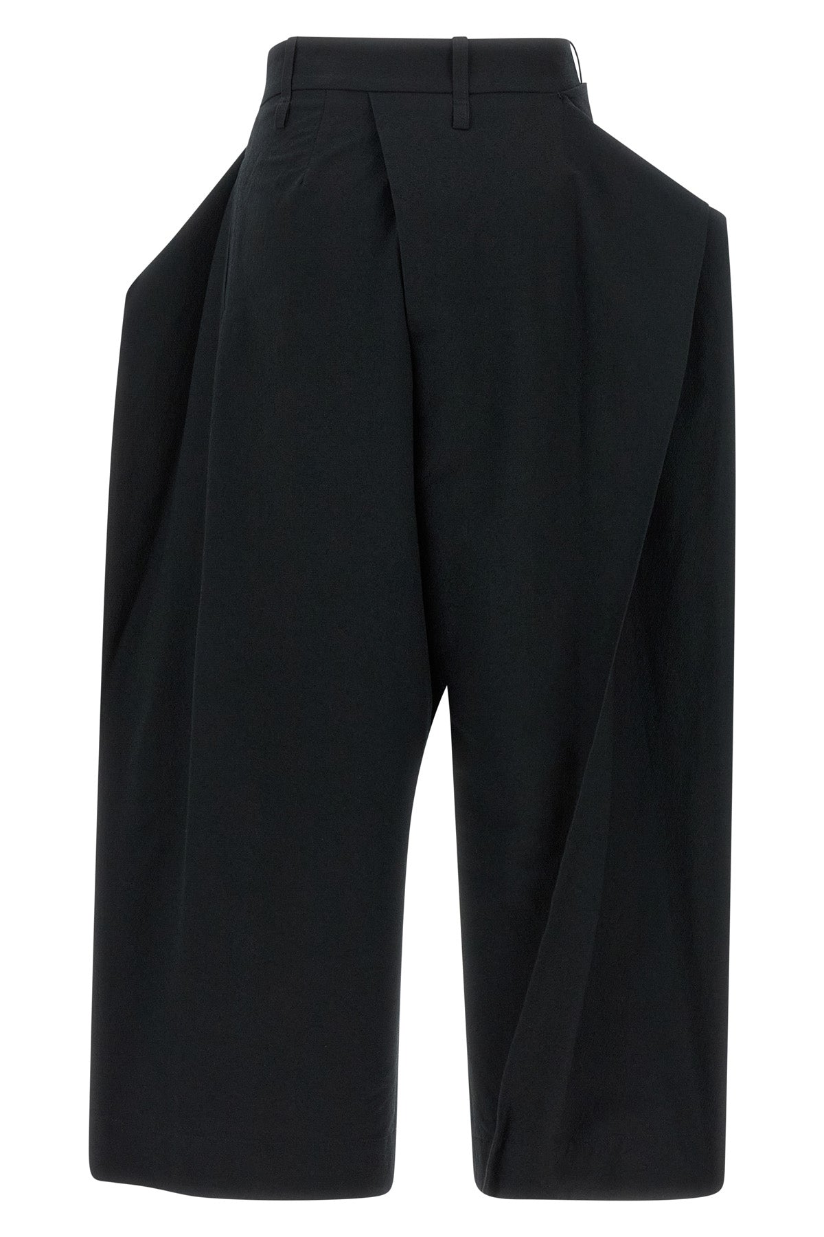 the issey miyake grainy pants define the space through architectural volumes