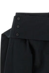 the issey miyake grainy pants define the space through architectural volumes