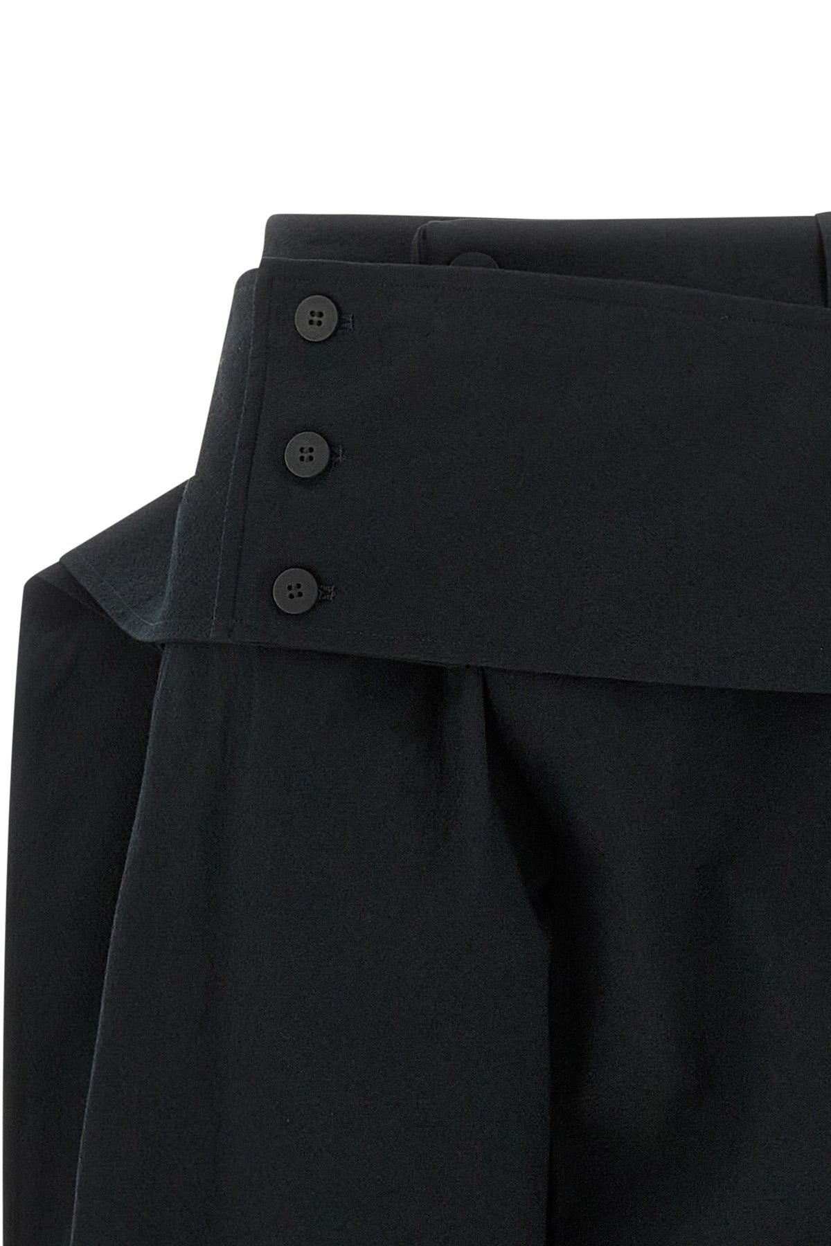 the issey miyake grainy pants define the space through architectural volumes