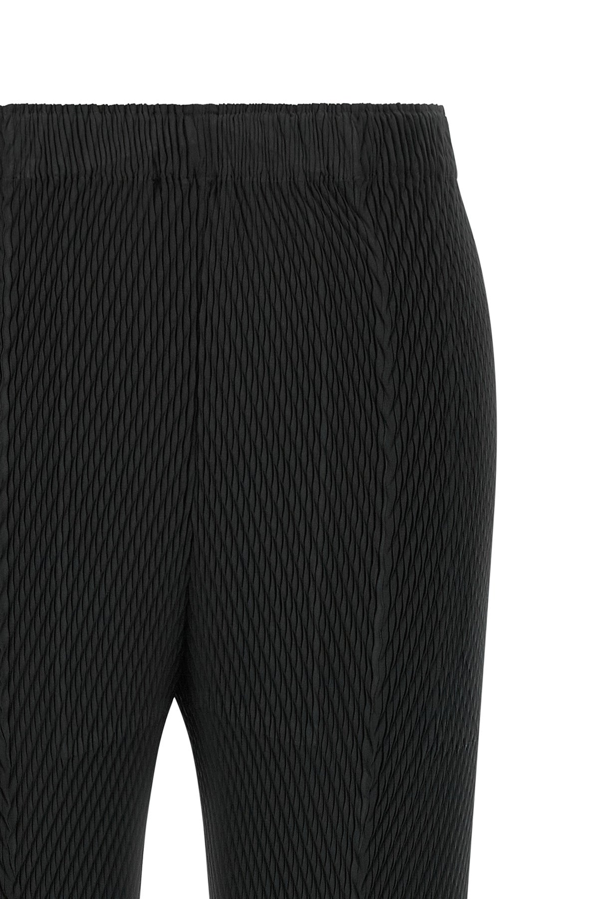the rhombus pleats issey miyake cropped pants redefine the silhouette through