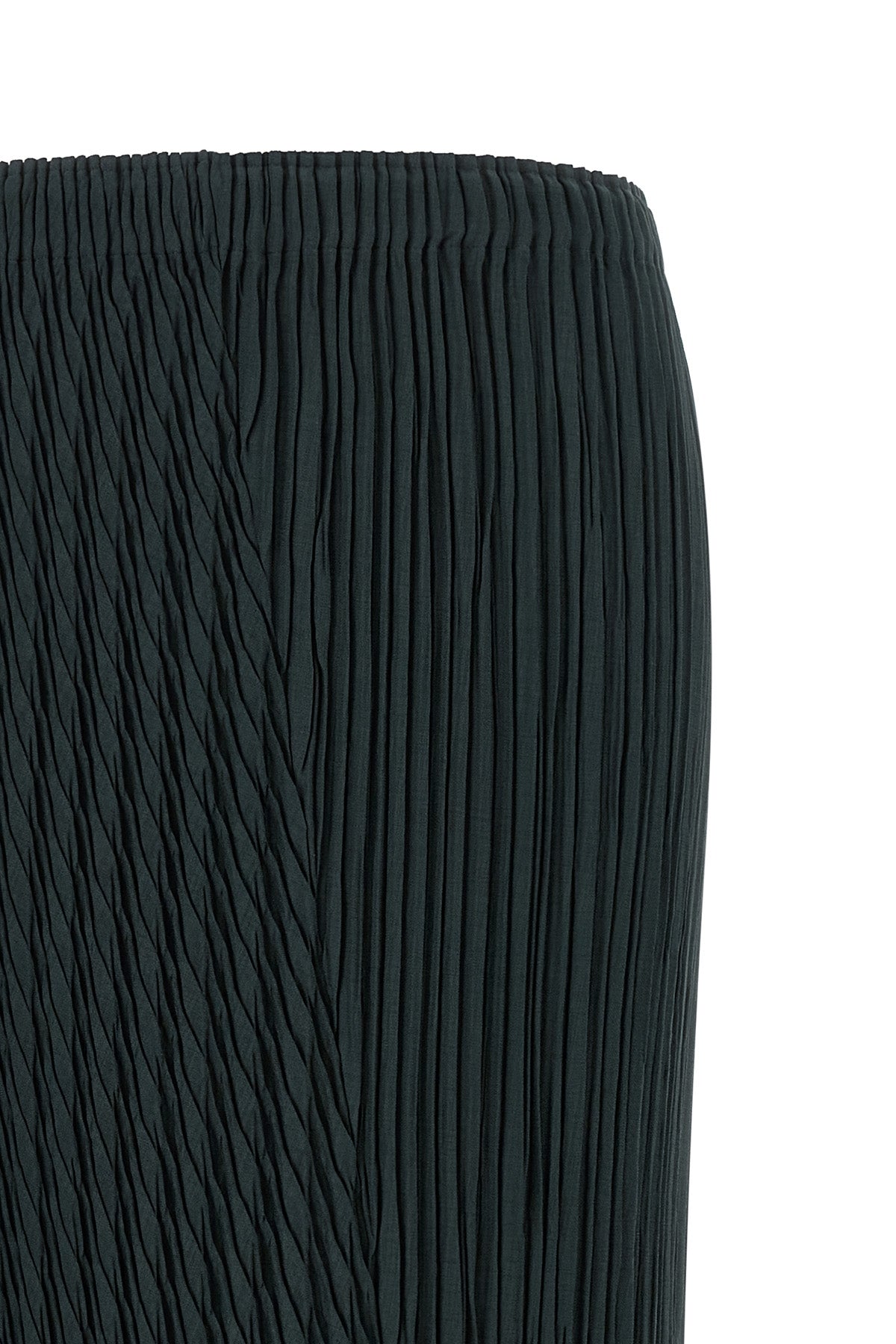 the issey miyake unfurling pleats midi skirt redefines volumes through an inno