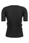 the sheer slit pleats top issey miyake redefines the codes of contemporary tai