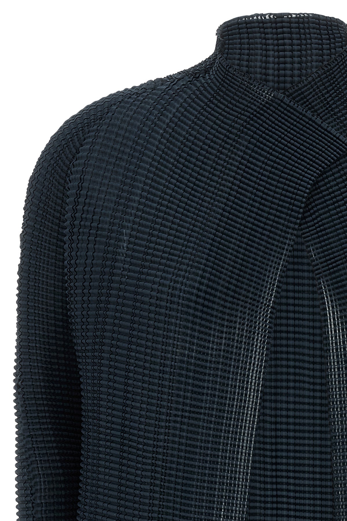 the wooly pleats-68 issey miyake cardigan redefines volumes through a complex