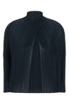 the wooly pleats-68 issey miyake cardigan redefines volumes through a complex