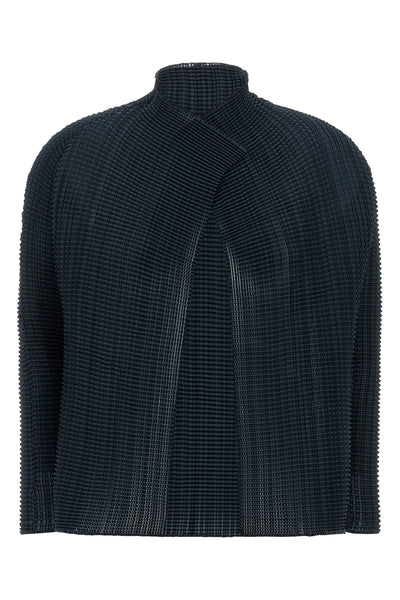 the wooly pleats-68 issey miyake cardigan redefines volumes through a complex