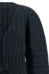 the unfurling pleats issey miyake cardigan redefines knitwear codes through a