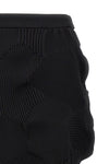 the midi skirt issey miyake kone kone redefines the volumes through a complex