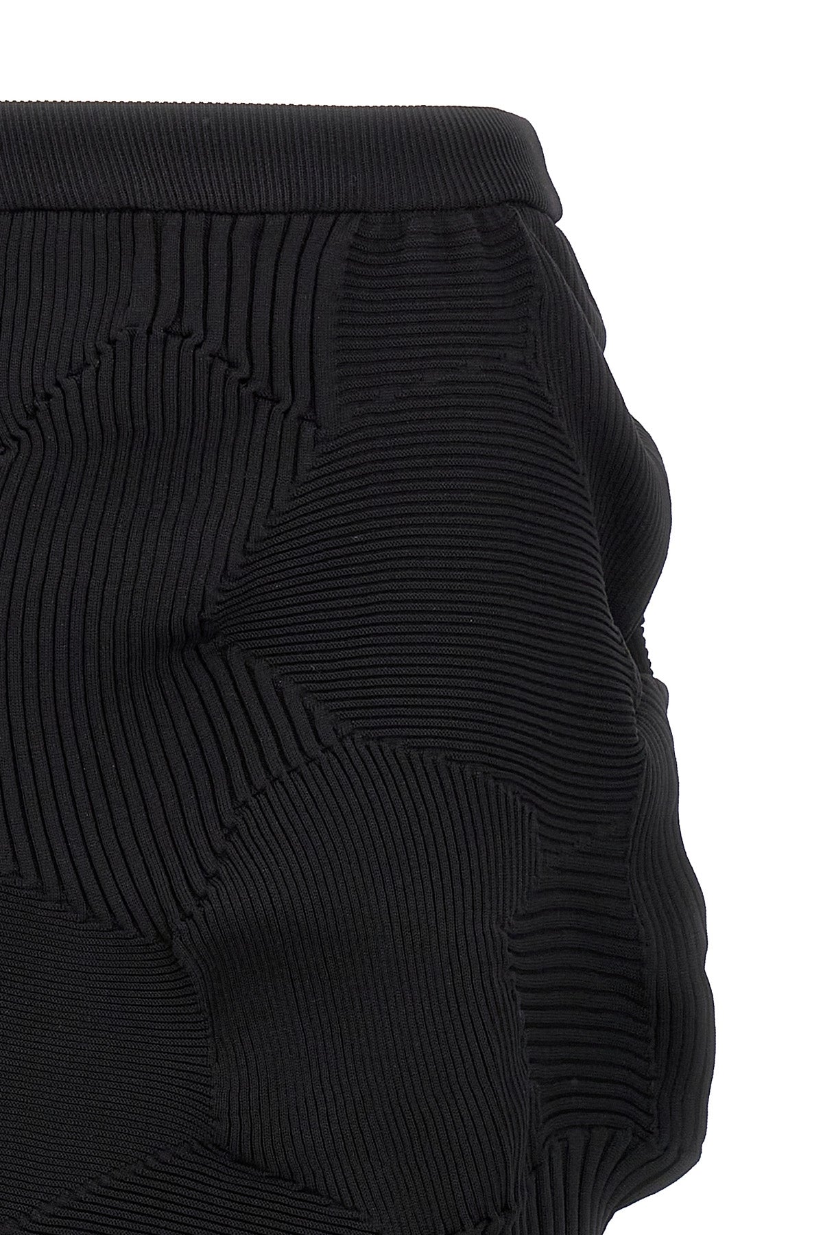 the midi skirt issey miyake kone kone redefines the volumes through a complex