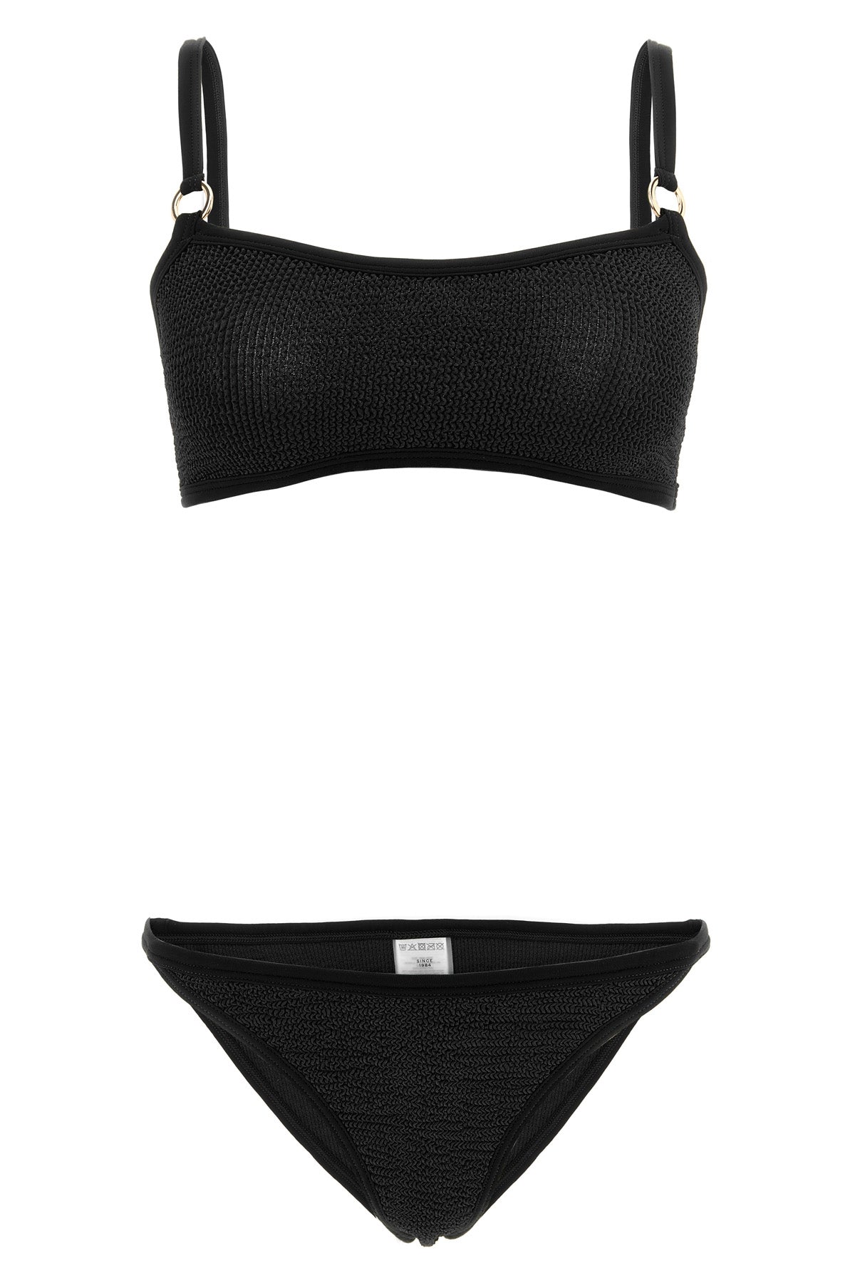 the hunza g iris bikini redefines beachwear aesthetics through an essential silh