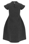 the jil sander dress exemplifies the brands mastery of minimalist tailoring and
