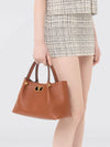 leather handbag with studs and vlogo signature