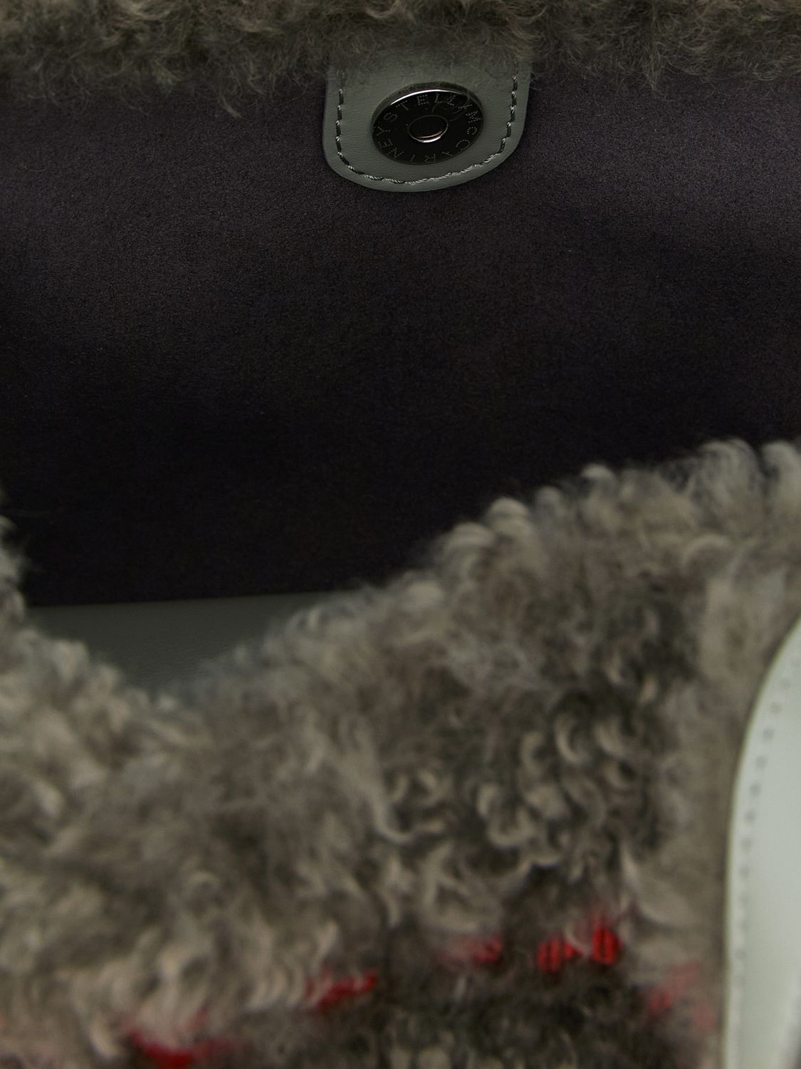 vegan shearling handbag with embroidered logo
