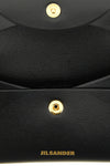 the jil sander folded coin purse in fine smooth calf leather embodies the puri