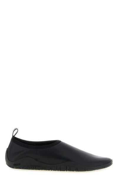 jil sander elbe slippers embody the essence of contemporary minimalism through