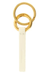 the jil sander keyring redefines essentiality through rigorous construction and