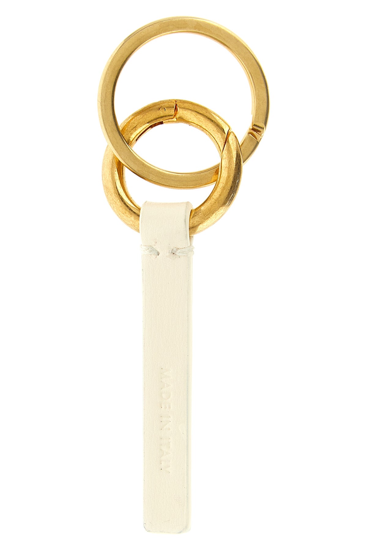 the jil sander keyring redefines essentiality through rigorous construction and