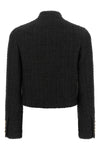the balmain double-breasted tweed short jacket defines the wardrobe through a ri