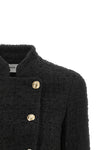 the balmain double-breasted tweed short jacket defines the wardrobe through a ri