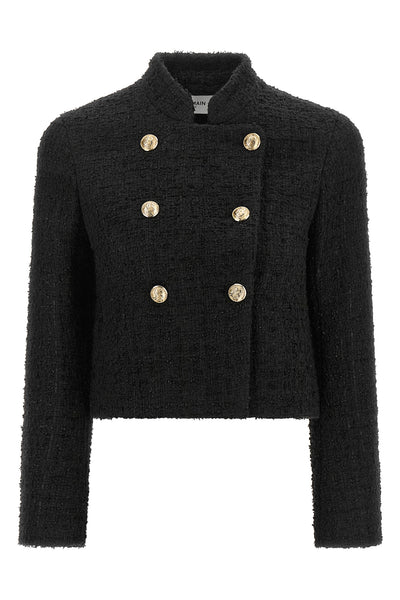 the balmain double-breasted tweed short jacket defines the wardrobe through a ri