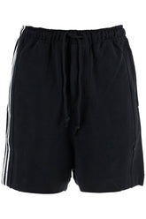 black cotton shorts with white stripes