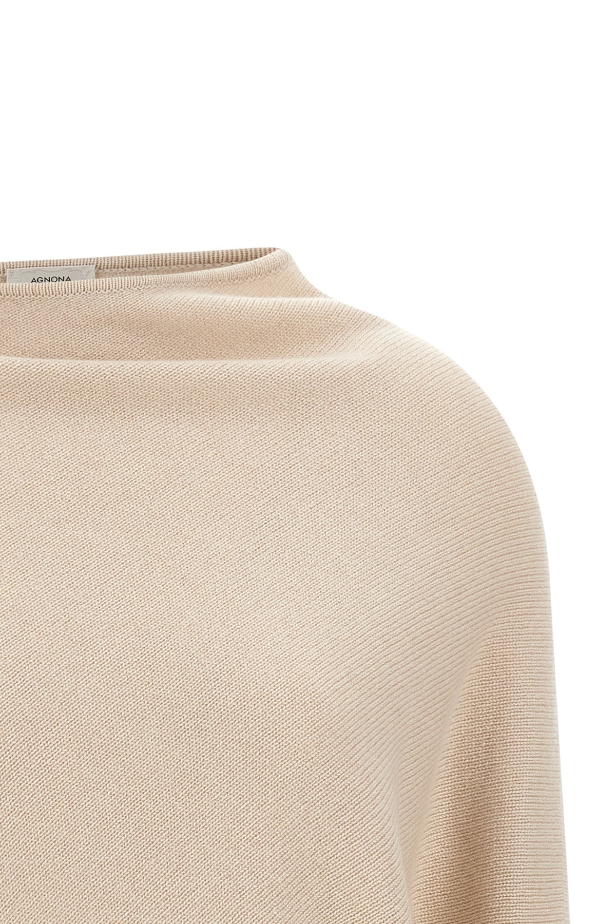 the agnona jersey redefines the codes of luxury knitwear through a fluid and dec