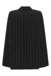 federica bonifaci tuxedo double-breasted cape redefines the codes of tradition