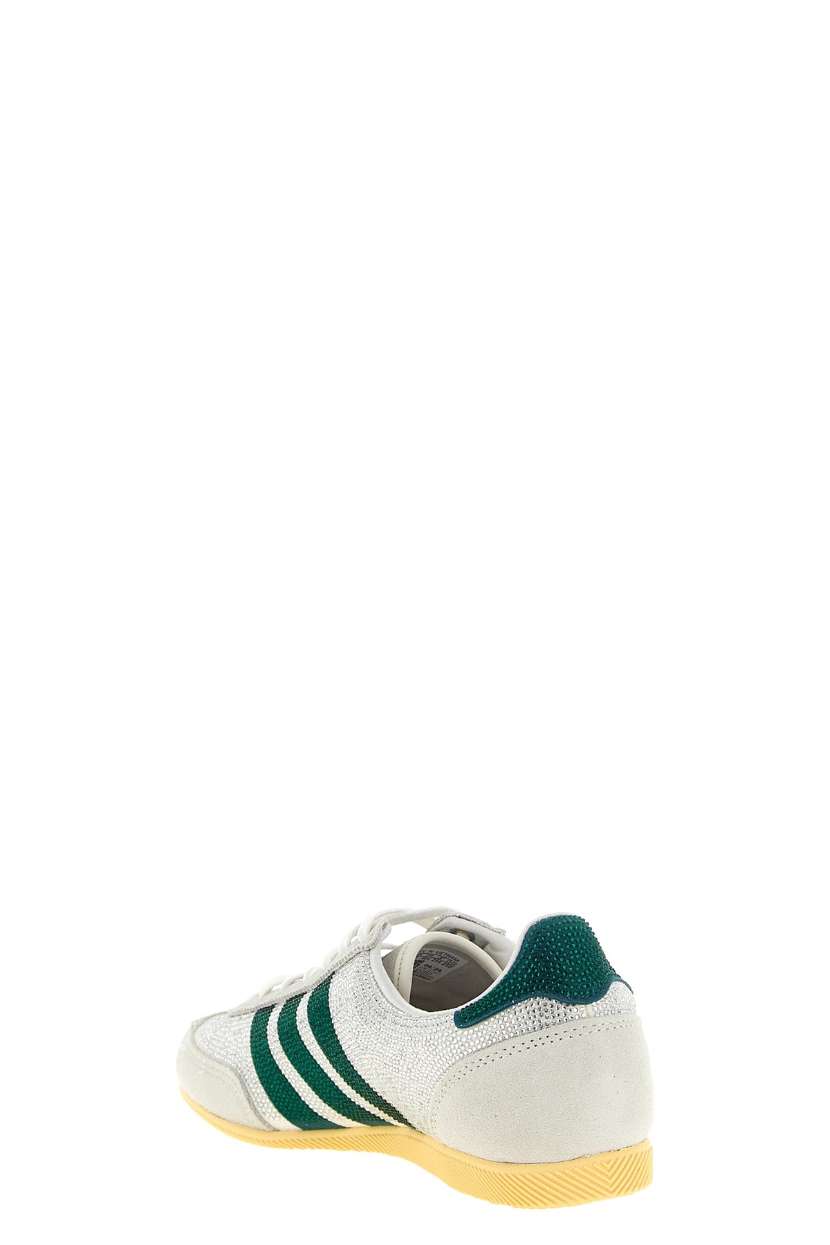 the adidas originals japan sneakers features a low-top silhouette defined by a