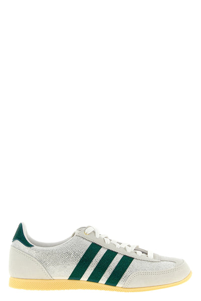 the adidas originals japan sneakers features a low-top silhouette defined by a